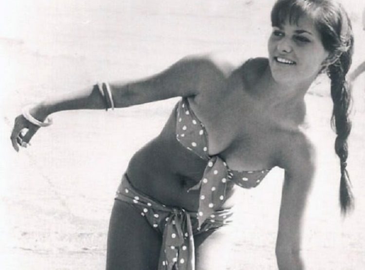 Claudia Cardinale at the beach